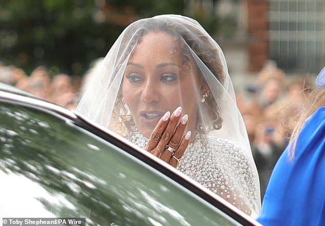 Mel B's Yorkshire Terrier Cookie proved she's woman's best friend as she played a very special role during the Spice Girls' wedding to hairdresser Rory McPhee on Saturday