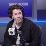The Jonas Brothers reflected on being approached with inappropriate questions early in their career while on Penn Badgley's podcast Podcrushed on Thursday; Nick Jonas pictured