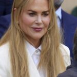 Nicole Kidman, 58, embraced her natural auburn locks at Wimbledon on Sunday after finally ditching wigs