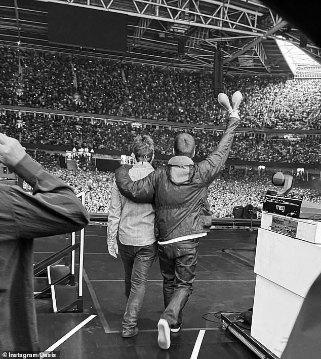 Liam and Noel walked out on stage holding hands as they made their long-awaited return last Friday