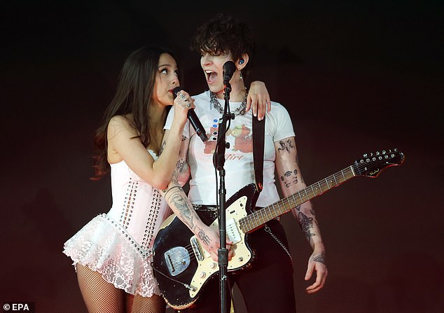 Olivia Rodrigo pays for therapy for her entire band and crew, even when they're not on tour, her guitarist revealed last month (Seen in June)