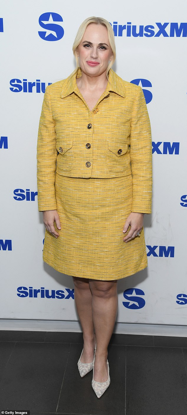 Rebel Wilson, 45, has slammed the second lawsuit filed against her by the producers of her directorial debut film The Deb, and released a song from the movie called F*** My Life