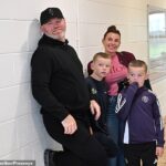 Wayne and Coleen Rooney were every inch the supportive parents as they watched their son Kai play for Manchester United in the 2025 Super Cup NI (pictured with their younger sons)