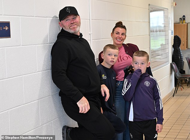 Wayne and Coleen Rooney were every inch the supportive parents as they watched their son Kai play for Manchester United in the 2025 Super Cup NI (pictured with their younger sons)