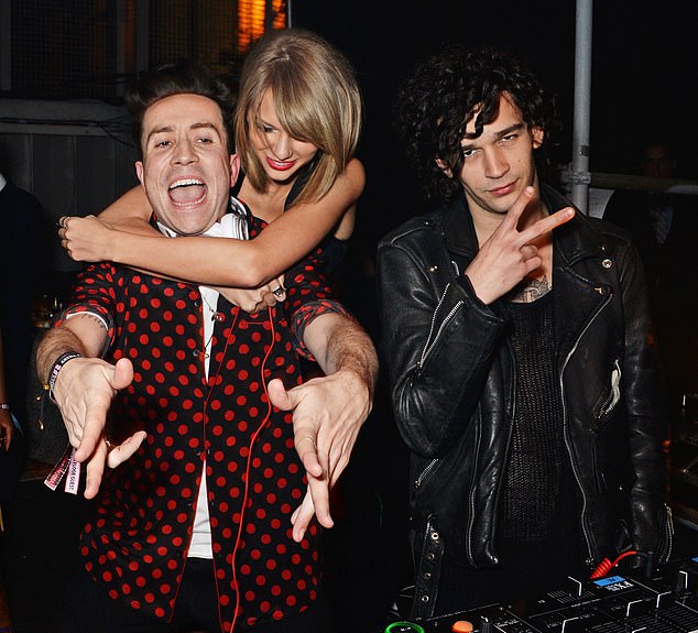 'She — listen, you're not allowed to say anything, and then she writes a whole album about it,' Welch said; Swift is pictured with Nick Grimshaw (L) and Healy (R) in 2015 in London