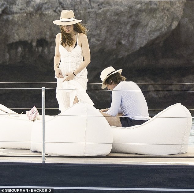 Tom Cruise and his 'new love' Ana de Armas showed their romance was heating up during a yacht break in Menorca this week
