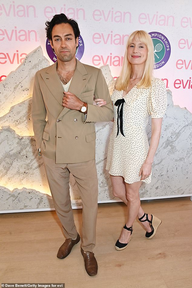 Rivals actor Alex Hassell arm in arm with his wife Emma King
