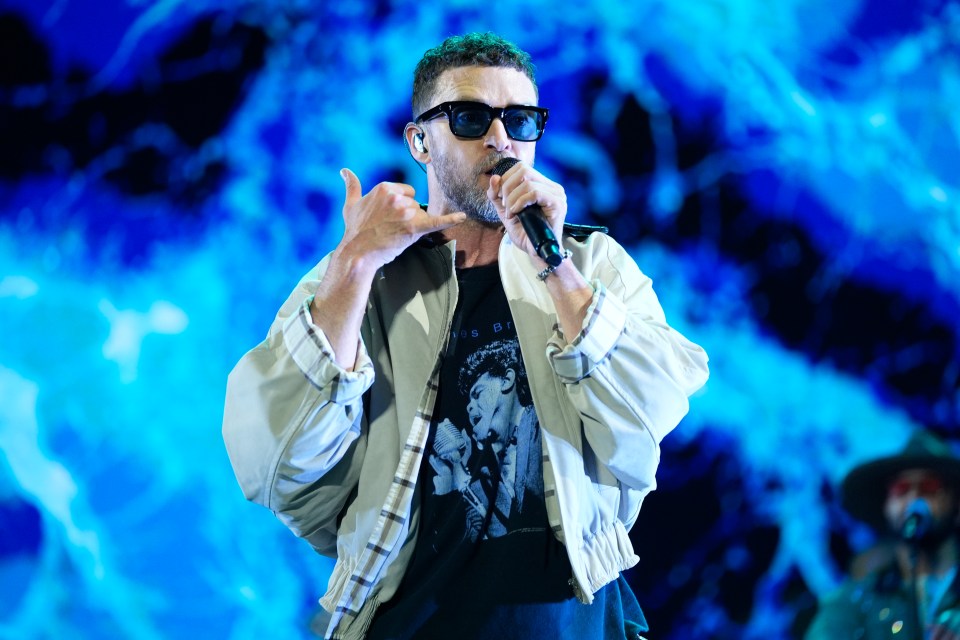 Justin Timberlake performing at a concert.