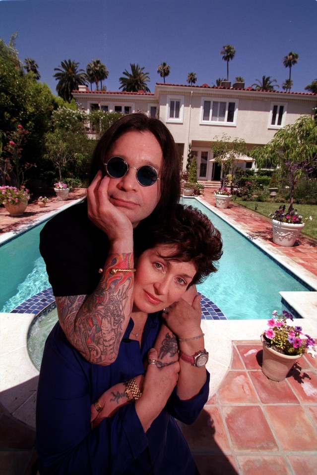 Ozzy and Sharon Osbourne by their pool.