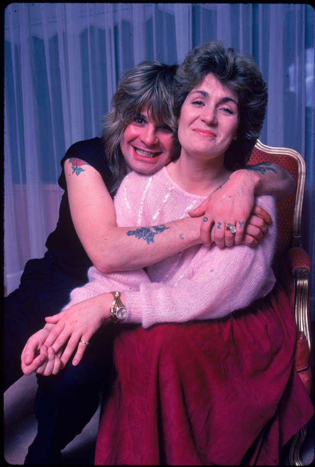 Ozzy Osbourne and Sharon Arden embracing.