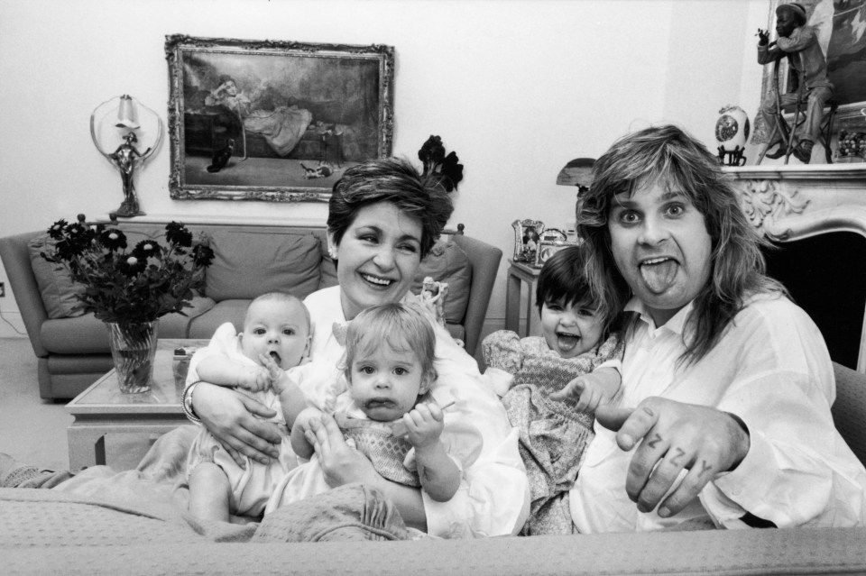 Black and white photo of Ozzy Osbourne with his family.