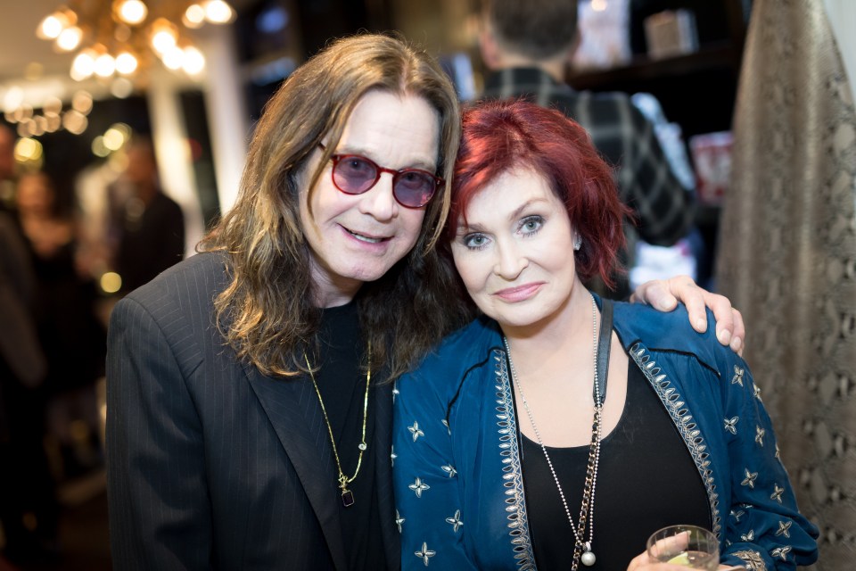 Ozzy and Sharon Osbourne at an art exhibition.