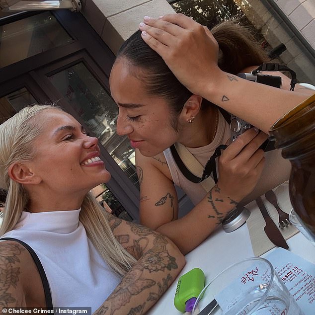 The former footballer, 33, has shared a series of loved-up snaps to Instagram with her new love interest Rachel Slade