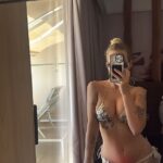 Lottie Moss, 27, showed off her incredible figure in a sizzling bikini snap from Spain on Thursday